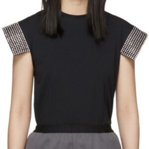 Chic Black Top with Embellished Sleeves